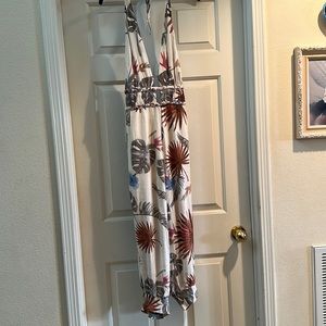 Halter neck floral jumpsuit with slits on sides